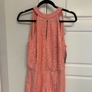Brand new romper short. All tags intact l. Size 2